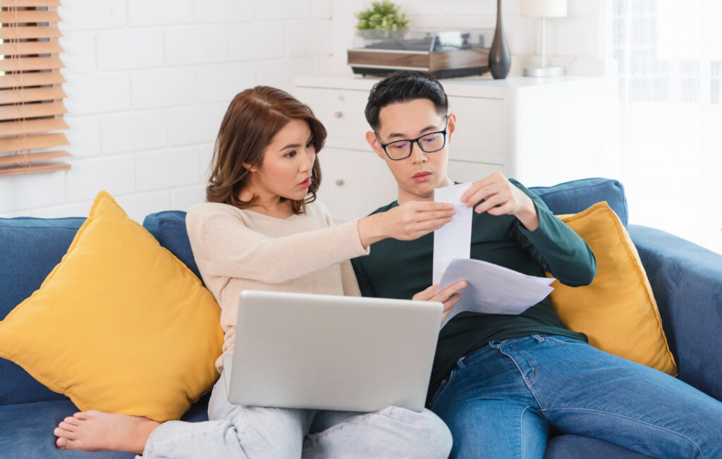 young asian couple considering heloc as a home loan option